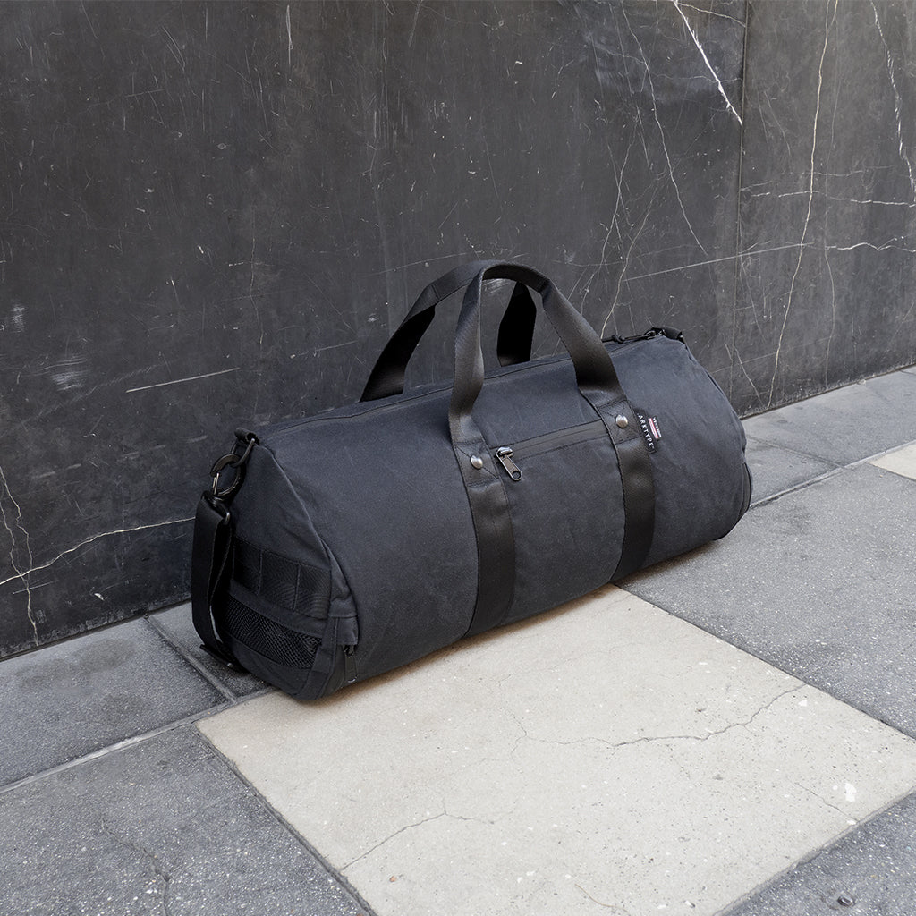 30 liter travel bag duffel rectangular narrow Boltpack - 30L Duffel - Waxed Canvas - Black